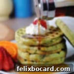 Stack of freshly made matcha waffles, ready to be served.