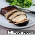 sliced chicken breast coated in balsamic rosemary glaze.