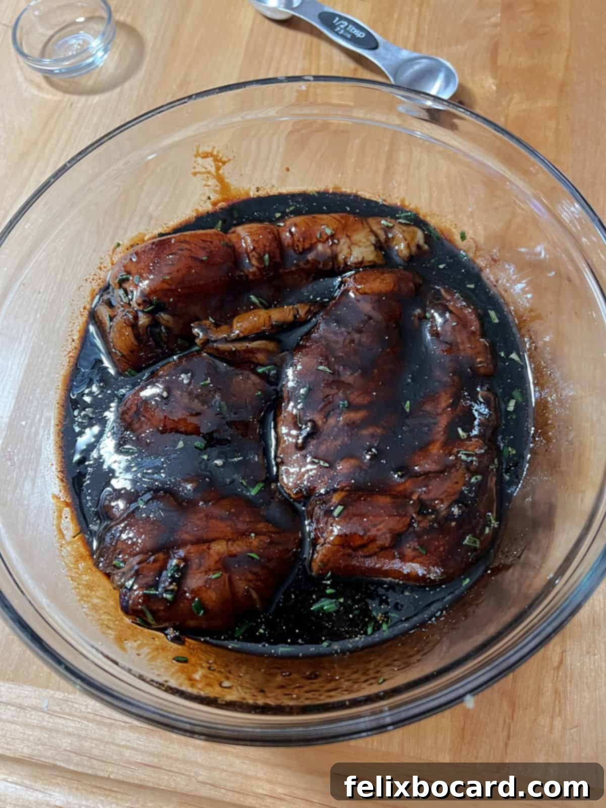 chicken breasts in marinade.