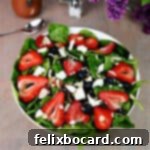 Strawberry Blueberry Spinach Salad ready to serve.