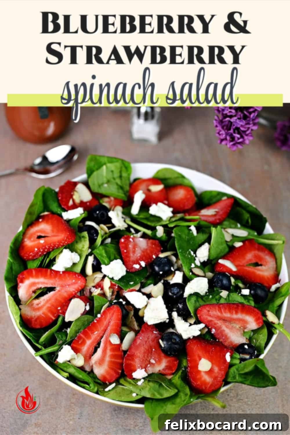 Pin for spinach salad with strawberries and blueberries.