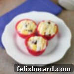 Delicious Cranberry Cream Cheese Muffins, perfectly golden-brown and ready to eat.