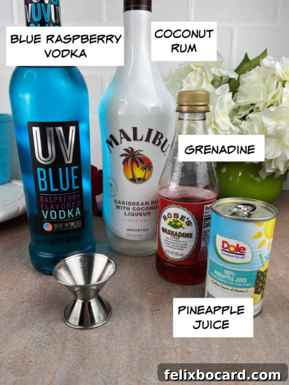 Ingredients: blue raspberry vodka, coconut rum, grenadine, pineapple juice.