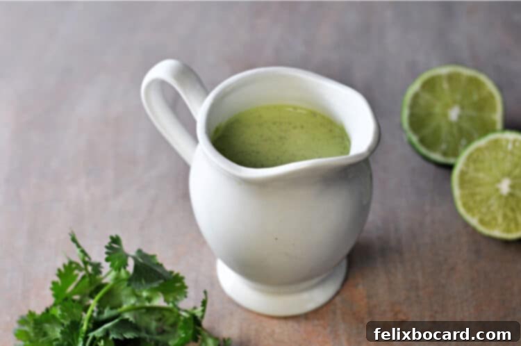 Cilantro-Lime Sauce 3 Cilantro Lime Sauce in a small white pitcher