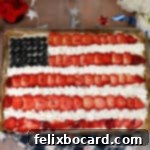 American Flag Fruit Pizza, a festive dessert for patriotic holidays.