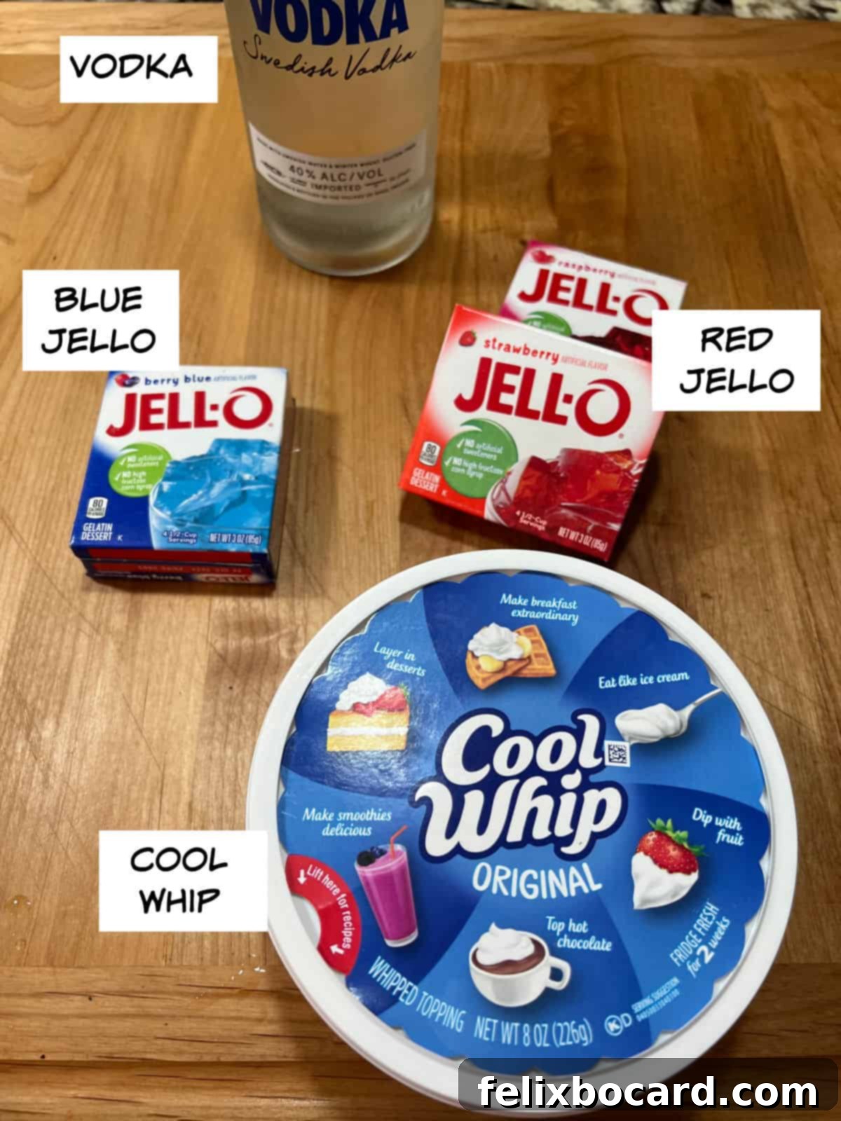 Ingredients for Red, White, and Blue Jello Shots: vodka, blue jello, red jello, Cool Whip.