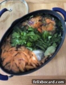 Vegetable scraps in a large stock pot.