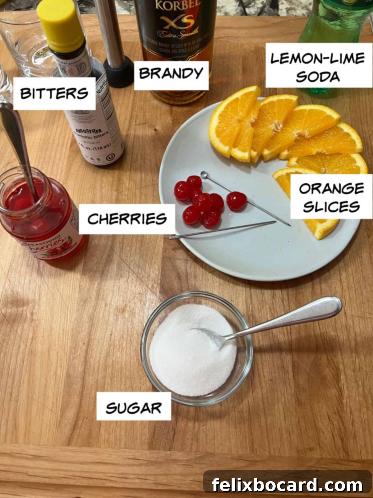 Sweet Wisconsin Brandy Old Fashioned 3 Ingredients for a Wisconsin Brandy Old Fashioned: brandy, bitters, lemon-lime soda, orange slices, cherries, and sugar.
