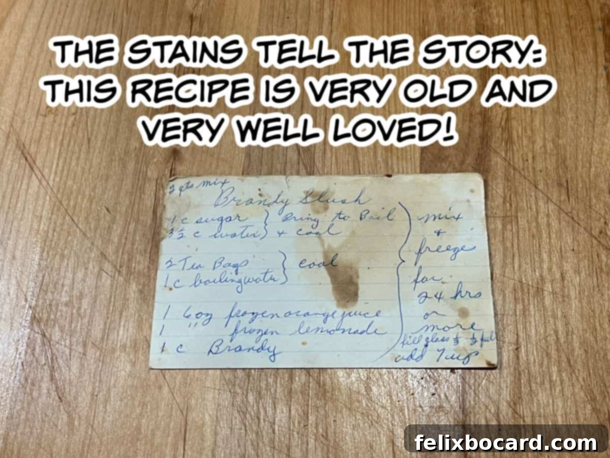 A vintage handwritten recipe card for Brandy Slush, titled 'Brandy Slush', with ingredients and instructions clearly visible, reflecting a cherished family tradition.