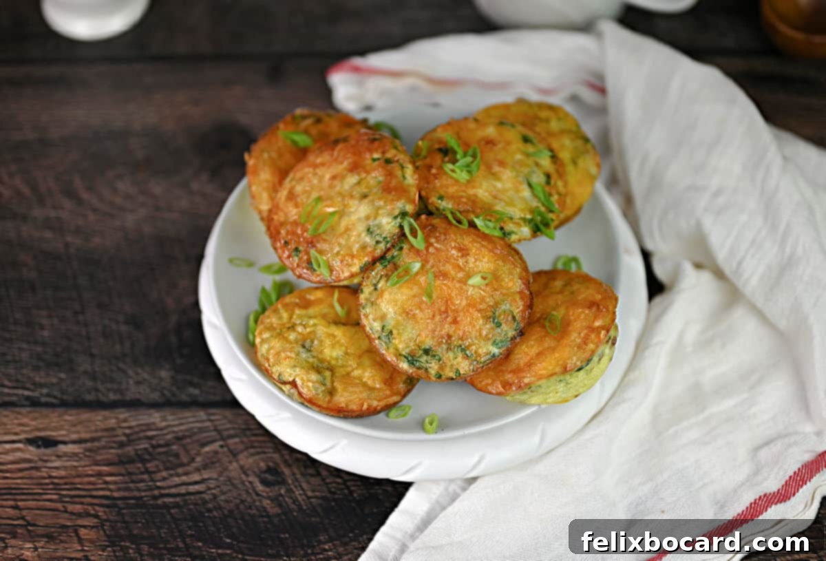 A plate of assorted air fryer egg bites with different fillings.