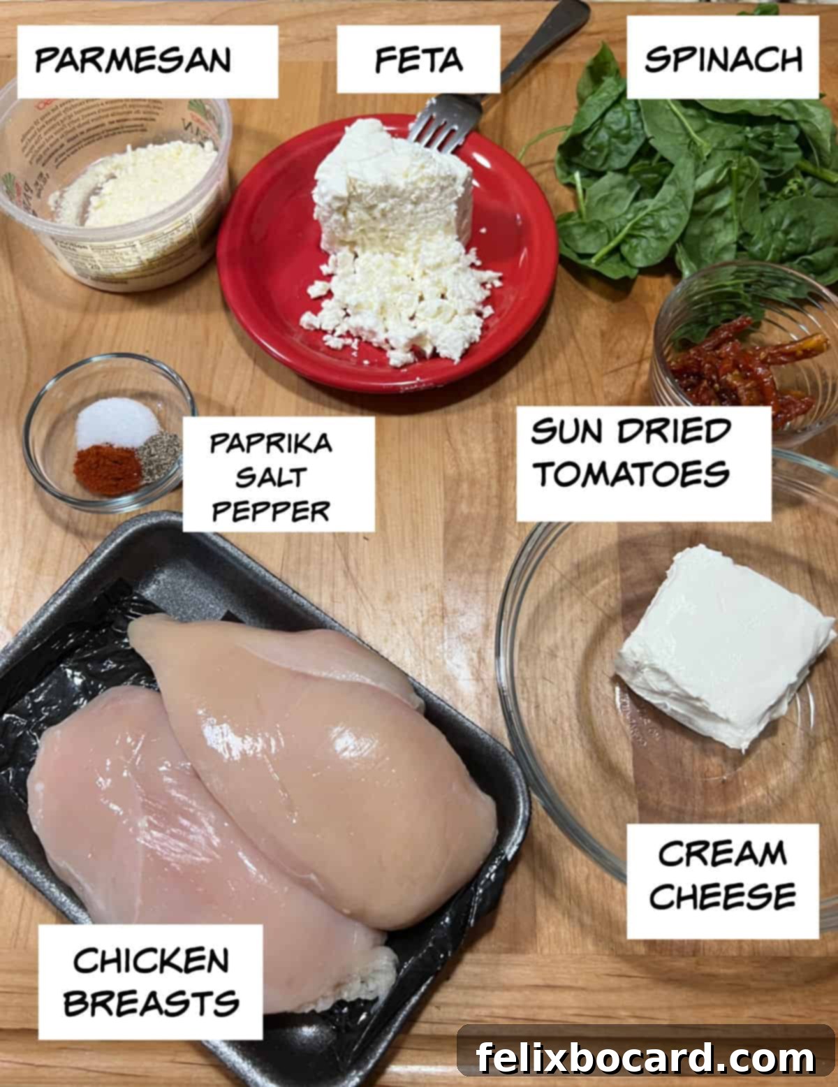 Ingredients: parmesan, feta, spinach, sun dried tomatoes, cream cheese, chicken breasts, paprika, salt, and pepper.