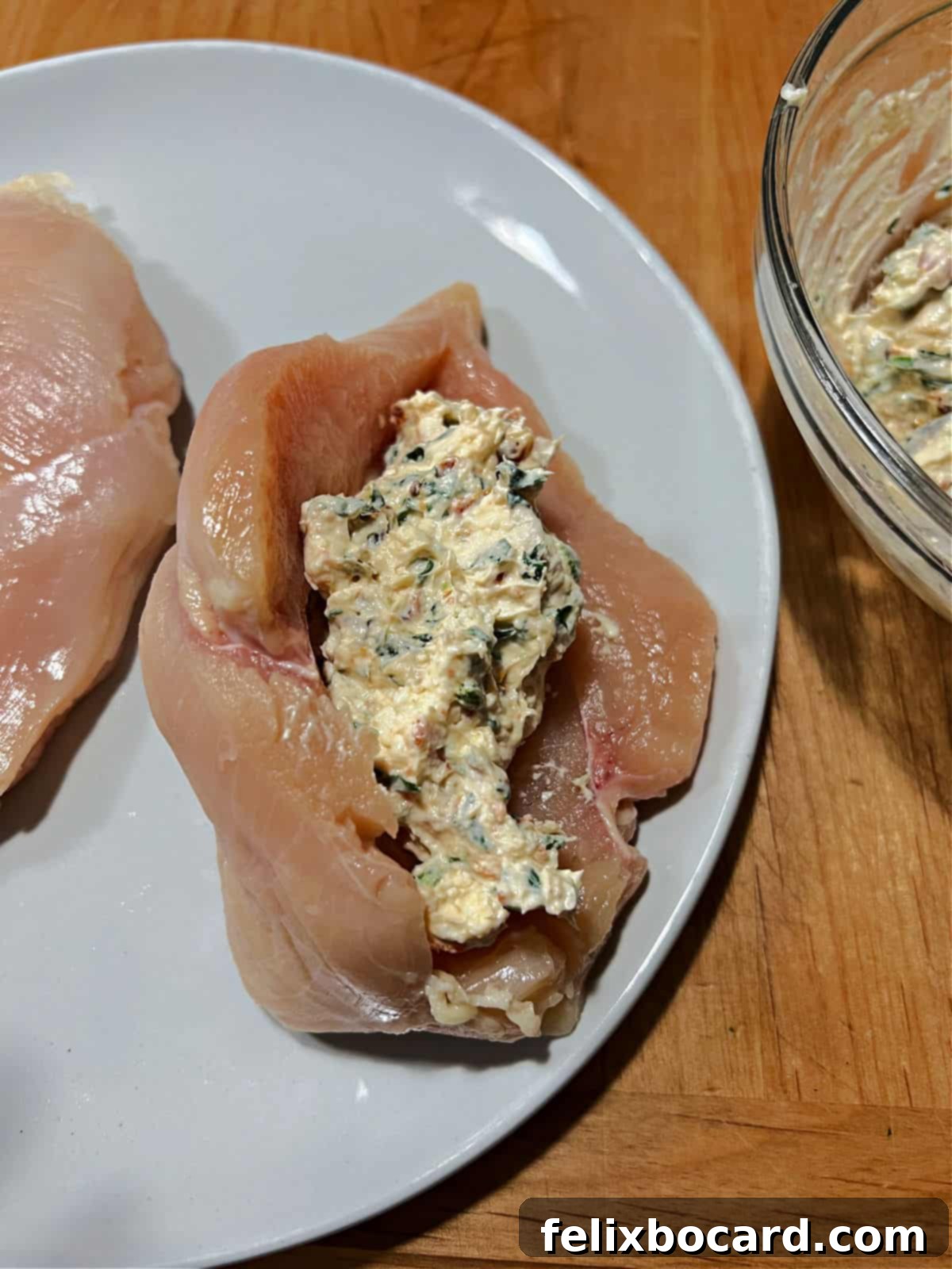 Cream cheese mixture stuffed in the chicken breast.