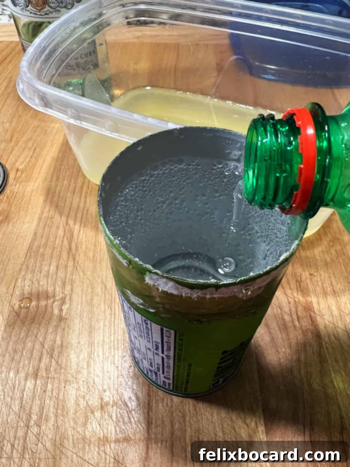 Blended Daiquiri Bliss 4 Measuring the soda in the empty concentrate can.