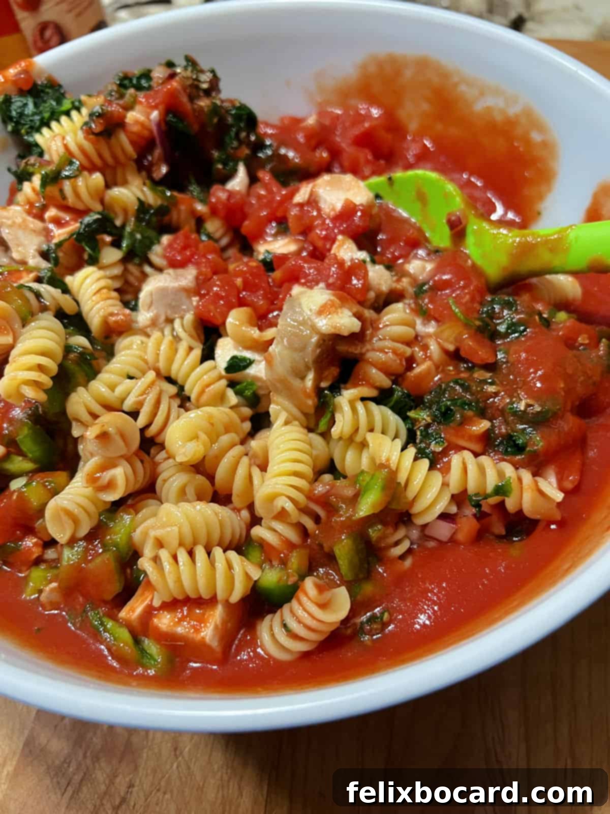 Mixing the casserole ingredients in a large bowl.