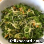 More Than Twenty Dried Cranberry Creations 11 A large serving bowl filled with a vibrant broccoli kale salad featuring dried cranberries and a creamy dressing.