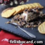 More Than Twenty Dried Cranberry Creations 5 cranberry goat cheese log on a cheese board with crackers