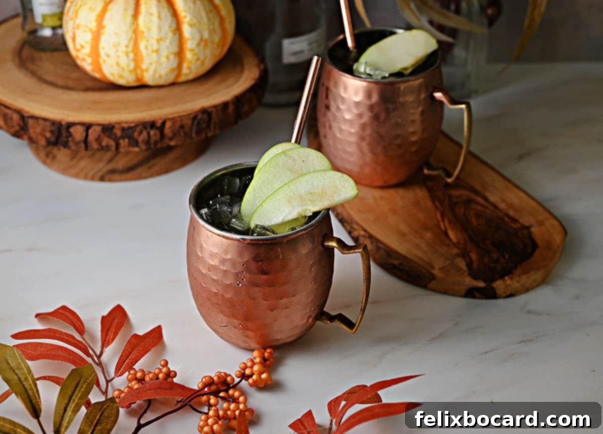 Spiced Apple Moscow Mule 7 Two Apple Cider Moscow Mules, perfectly garnished and ready to drink.