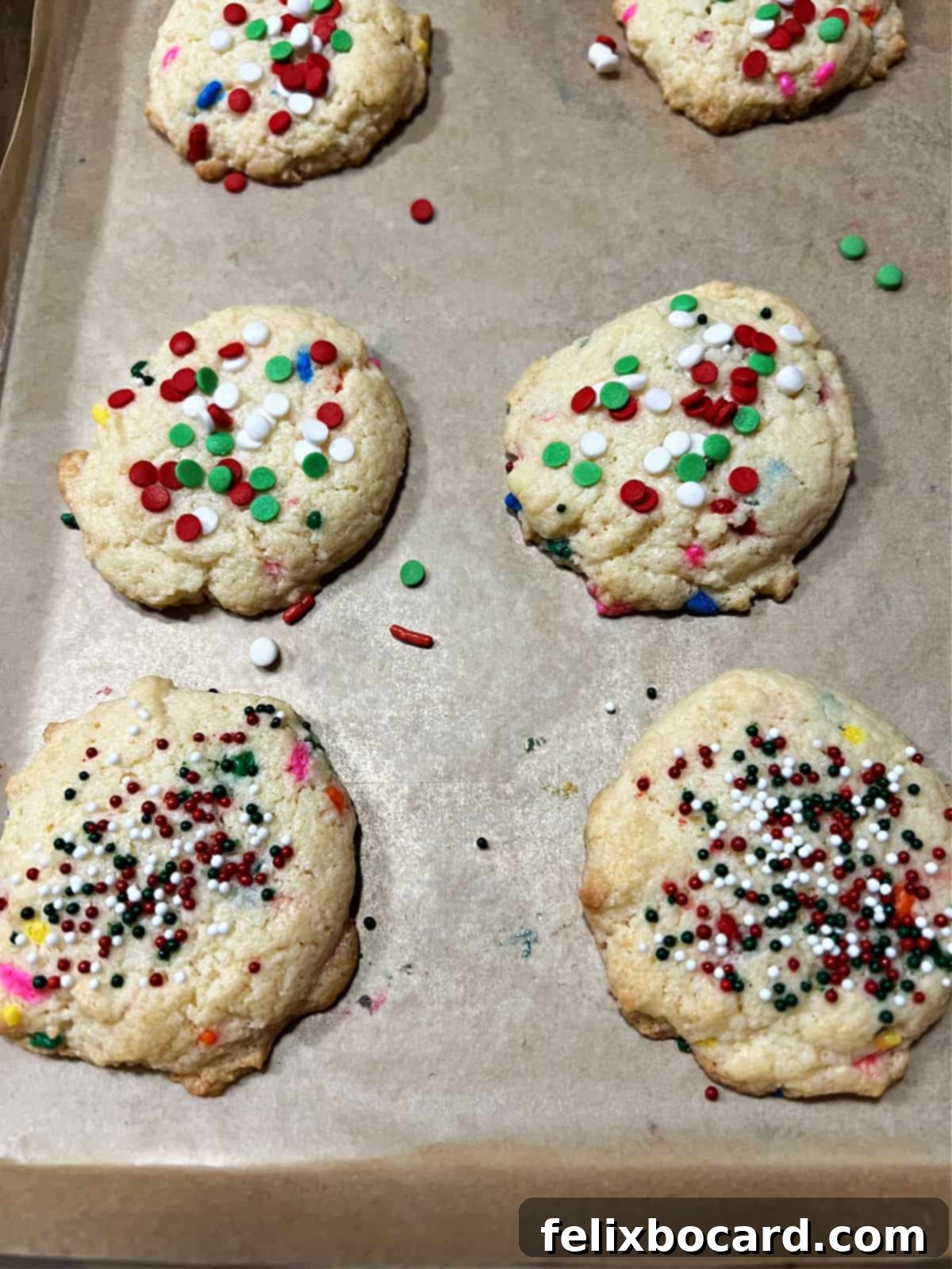 Close-up of baked cake mix cookies with Christmas funfetti sprinkles.