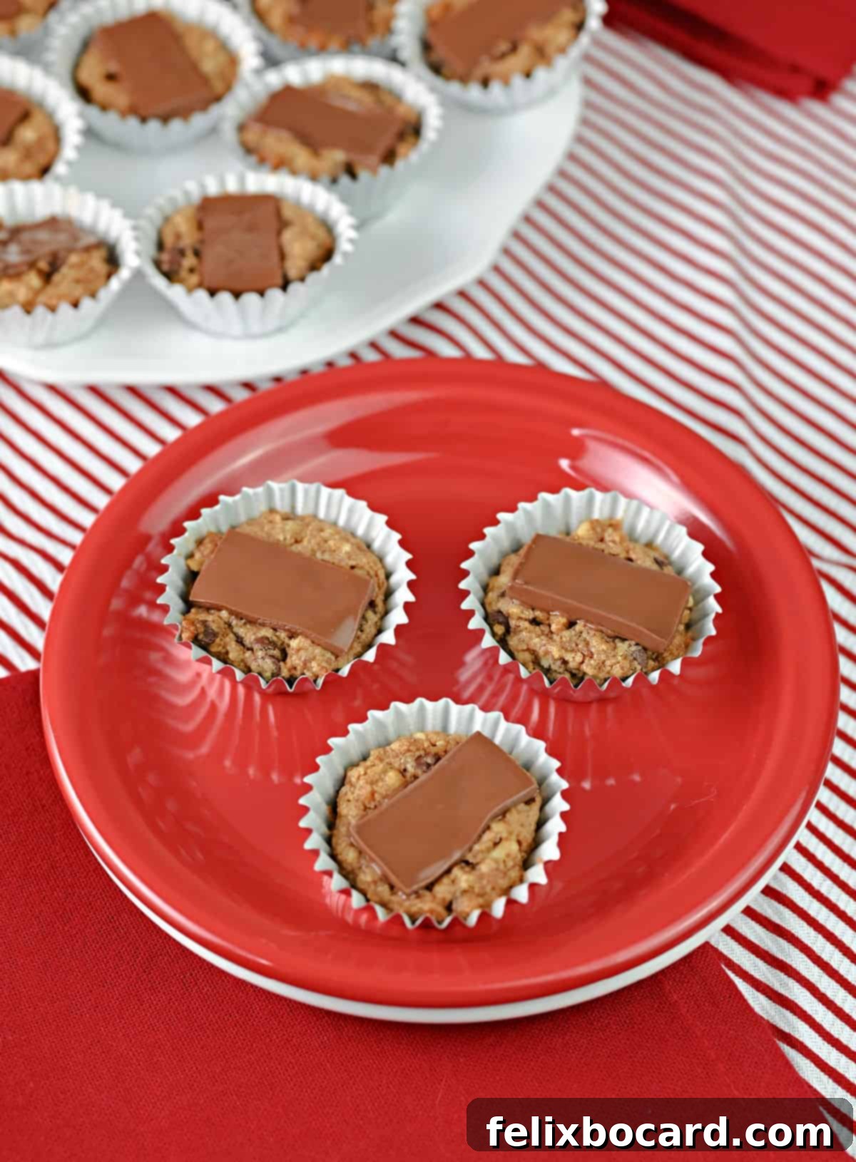Elegant French Christmas Cookies 5 3 French Christmas cookies on a small red plate.