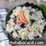 21 Delicious Makeovers for Your Leftover Shredded Chicken 9 Chicken Waldorf Salad featuring an appetizing blend of grapes and apples.