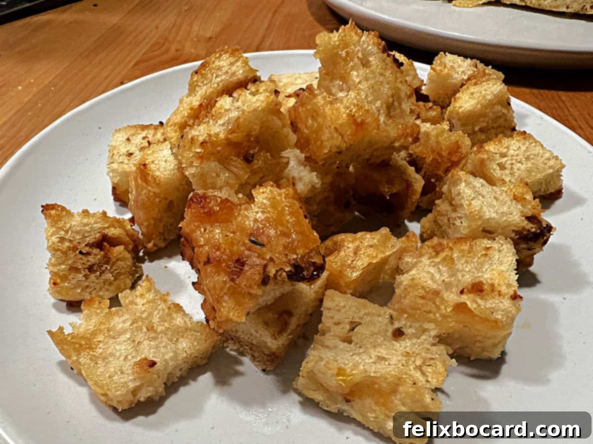 Simple Sun-Dried Tomato & Rosemary Focaccia 12 Golden-brown focaccia cut into cubes and toasted, ready to be used as croutons.
