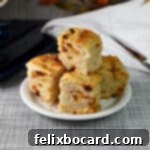 Simple Sun-Dried Tomato & Rosemary Focaccia 15 A plate of sun dried tomato focaccia, perfectly baked and garnished.