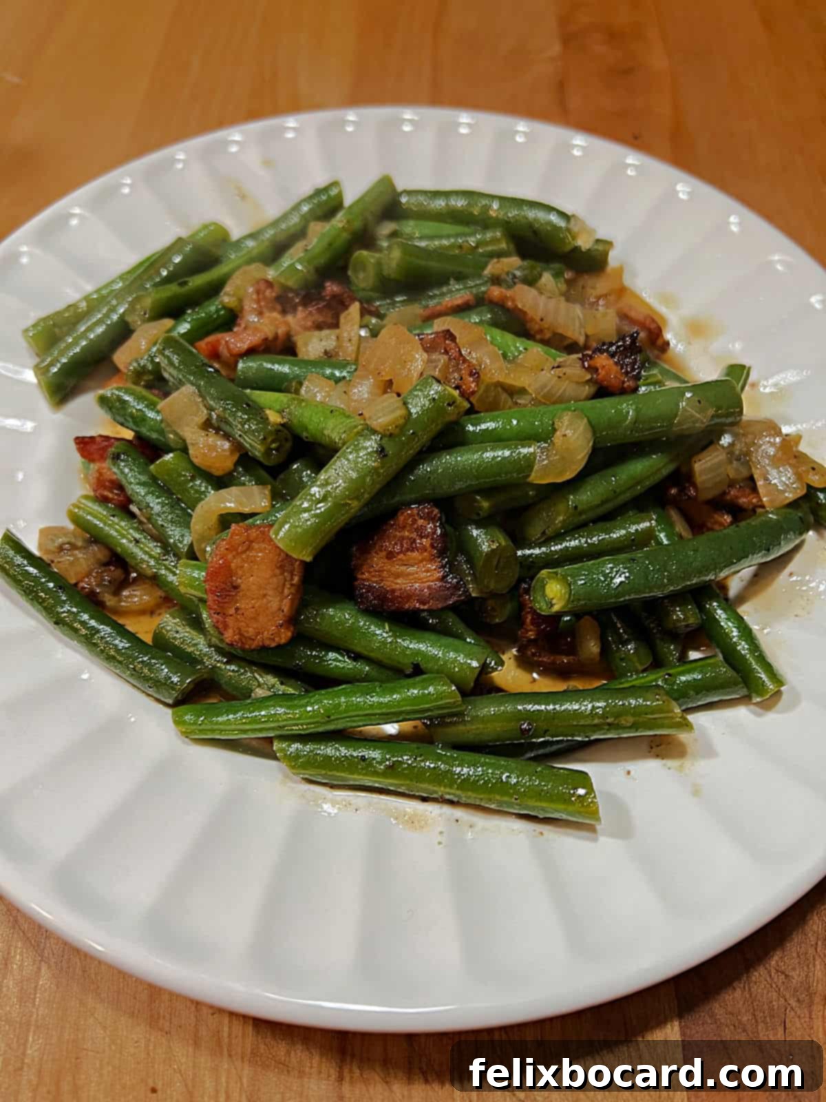 A vibrant plate featuring Texas Roadhouse style green beans alongside other meal components, showcasing their versatility.