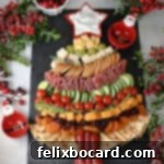Charcuterie board in a Christmas tree shape.
