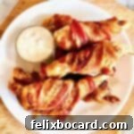 Bacon-Wrapped Chicken Tenders, crispy and delicious.