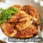 Crunchy Parmesan Chicken, a crispy chicken tenderloin dish.
