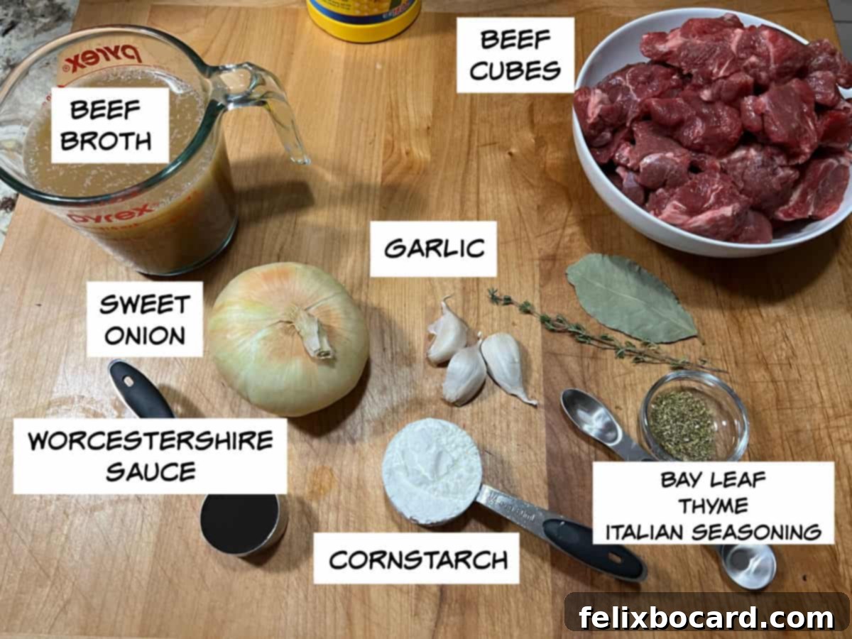 Selection of fresh ingredients including beef cubes, broth, onion, garlic, Worcestershire sauce, cornstarch, bay leaf, Italian seasoning, and thyme, ready for Instant Pot Beef Tips.