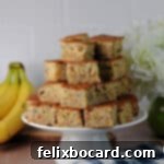 stack of cut squares of banana bread on a cake server.