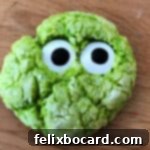 Spooky Eyeball Treats 11 Vibrant green monster eye cookie, a square cropped version suitable for recipe card thumbnails.