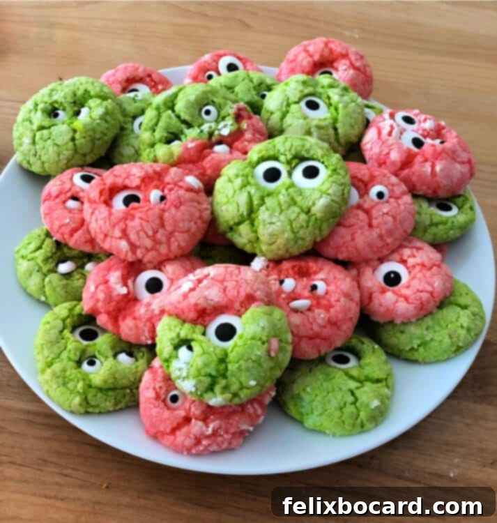 Spooky Eyeball Treats 6 A plate brimming with various colored monster eye cookies, some with multiple eyes, showcasing their fun and festive appeal.