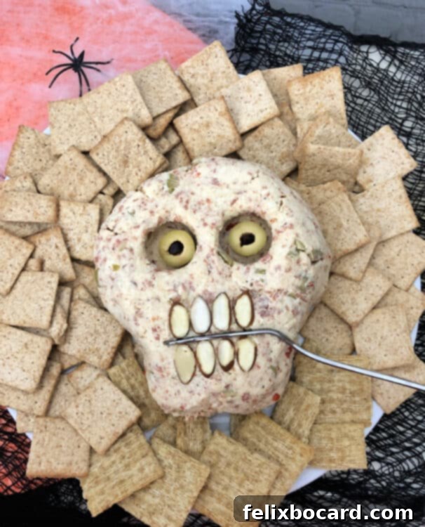 Spooky Pepperoni Skull Cheeseball 7 Pepperoni Cheese Ball with black pupils (Kalamata)
