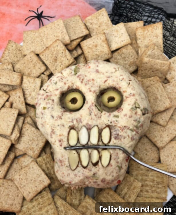 Spooky Pepperoni Skull Cheeseball 6 Pepperoni Cheese Ball with hollow pupils