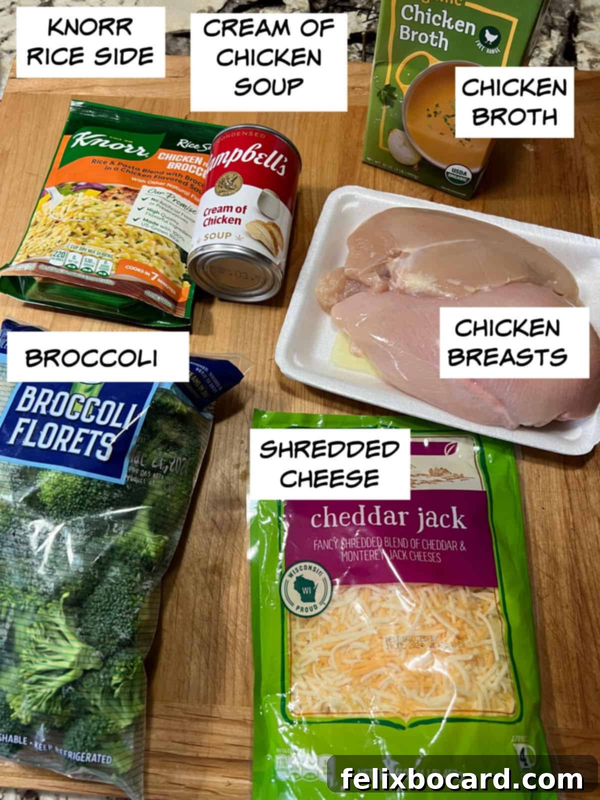 Ingredients: Knorr rice side packet, cream of chicken soup, chicken broth, chicken breasts, broccoli, and shredded cheese.