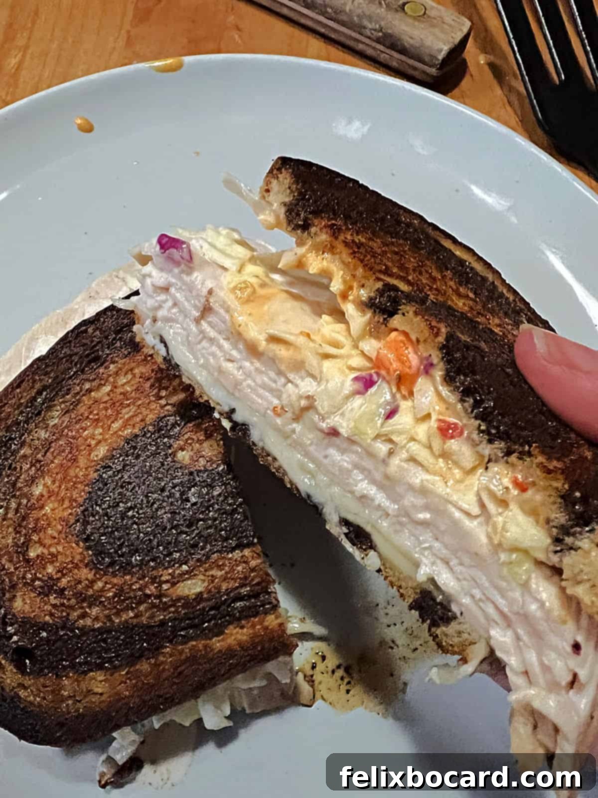 Golden Grilled Turkey Reuben 13 Cut Rachel sandwich (grilled turkey Reuben).
