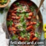 Close-up of vibrant, glazed stovetop carrots, showing their tender texture and a hint of their sweet, savory coating.