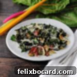 A pristine white plate showcases beautifully roasted Swiss chard, ready to be enjoyed as a healthy and flavorful meal.