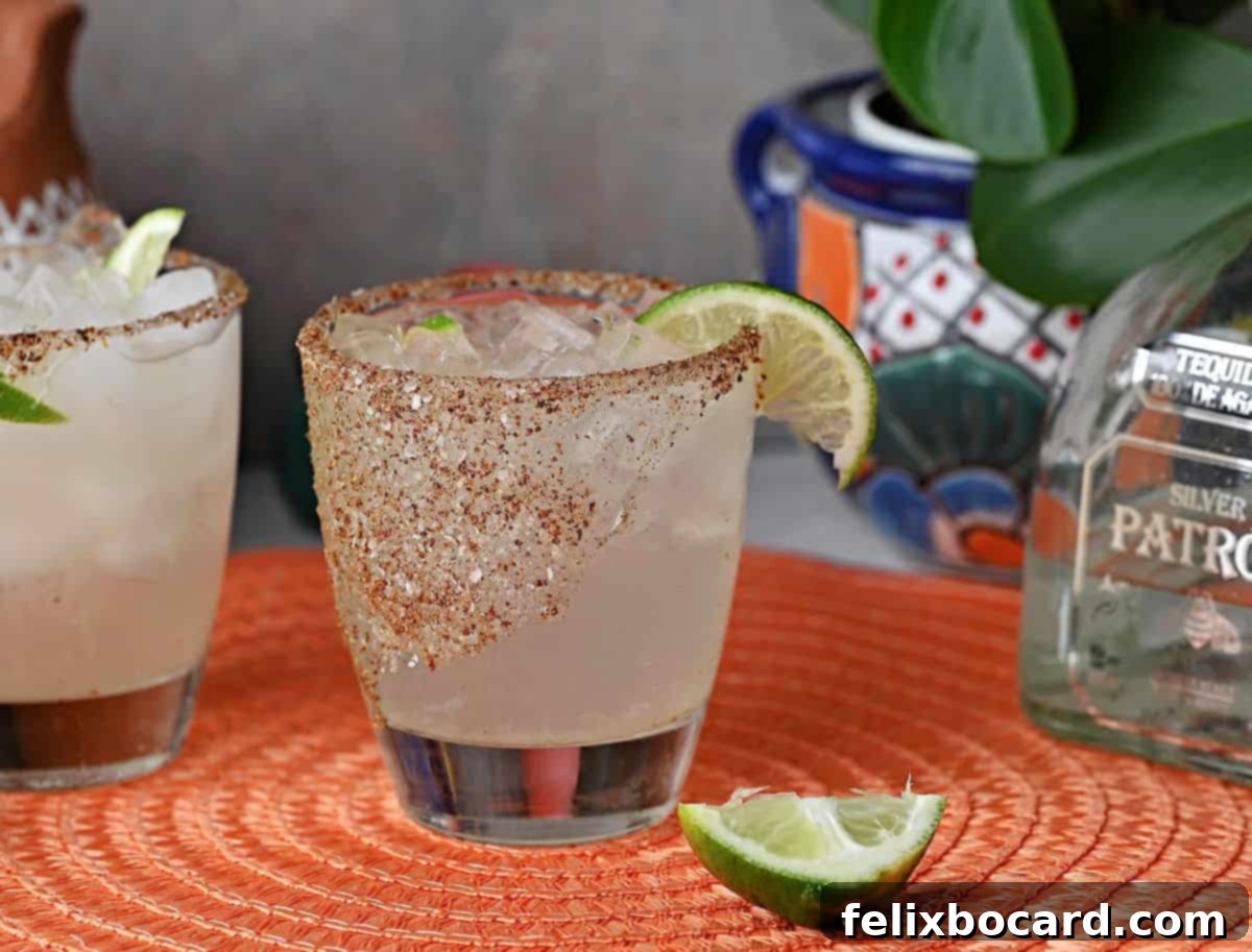 Close-up of a homemade Chili's Patron Especial Margarita garnished with a lime wheel, highlighting its freshness.