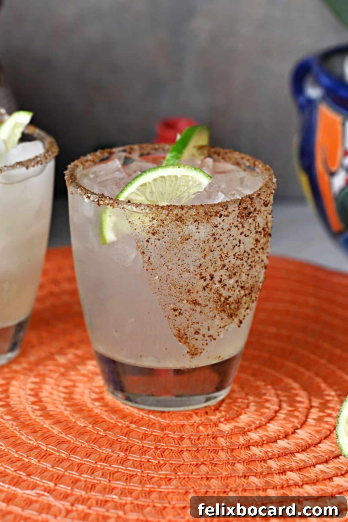 A vibrant Chili's copycat Patron margarita, beautifully garnished with fresh lime slices, waiting to be enjoyed.