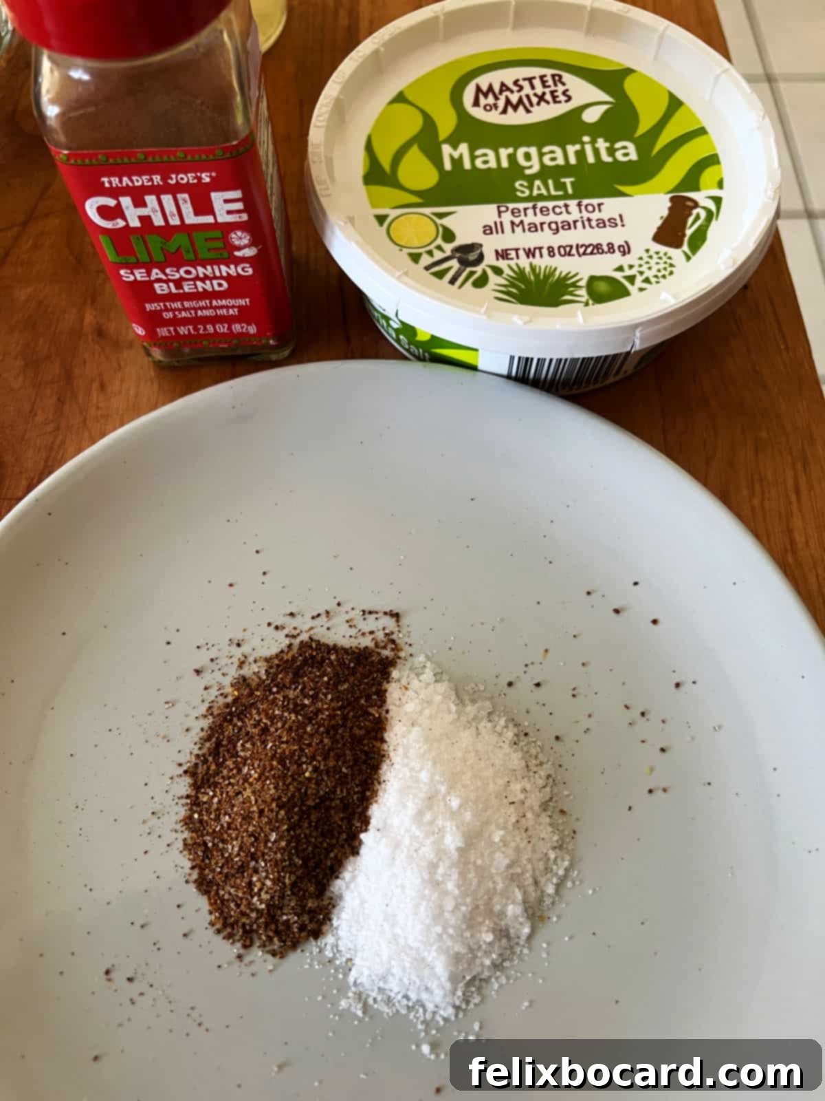 A plate featuring a perfect blend of chili lime seasoning and coarse salt, ready for rimming a margarita glass.