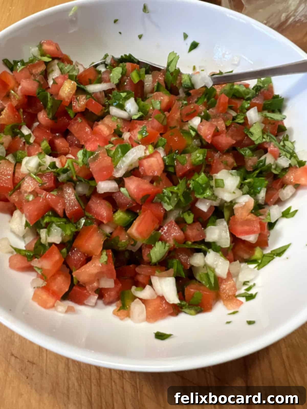 Avocado Pico de Gallo 6 Freshly mixed Pico de Gallo in a bowl, vibrant and ready for the next step.