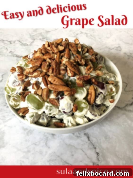 Pineapple and grape salad in a glass bowl