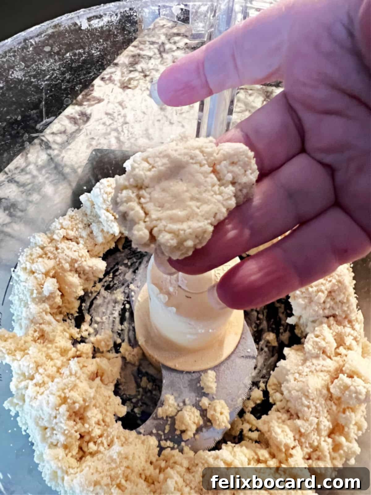 squeezing the dough.