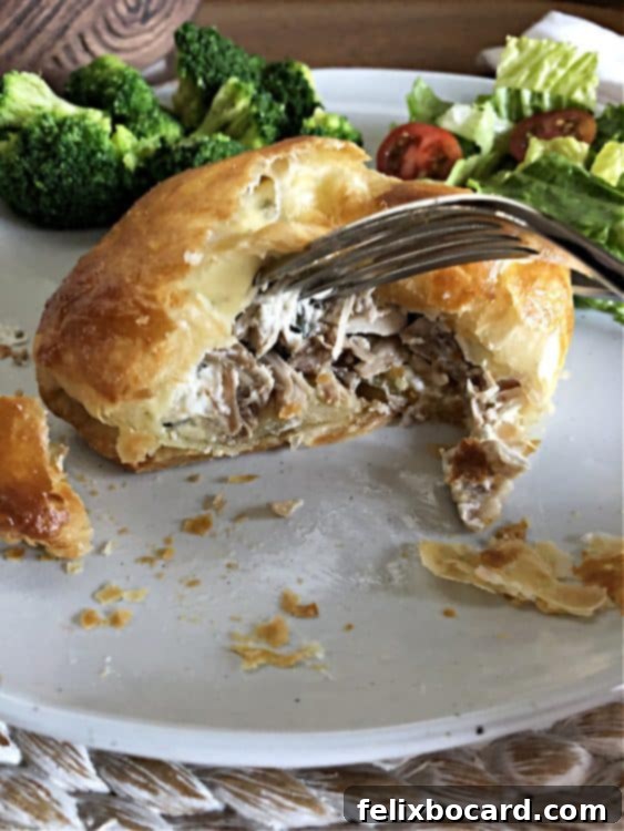 Fork showing the inside of the stuffed pastry