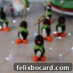 Penguin Party Bites 10 group of penguin appetizers surrounded by twinkle lights.