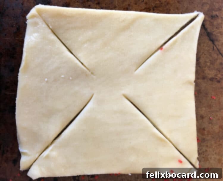 square dough with cuts from corners