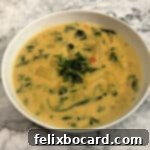 Golden Butternut Squash Chowder 9 Butternut squash chowder in a white bowl